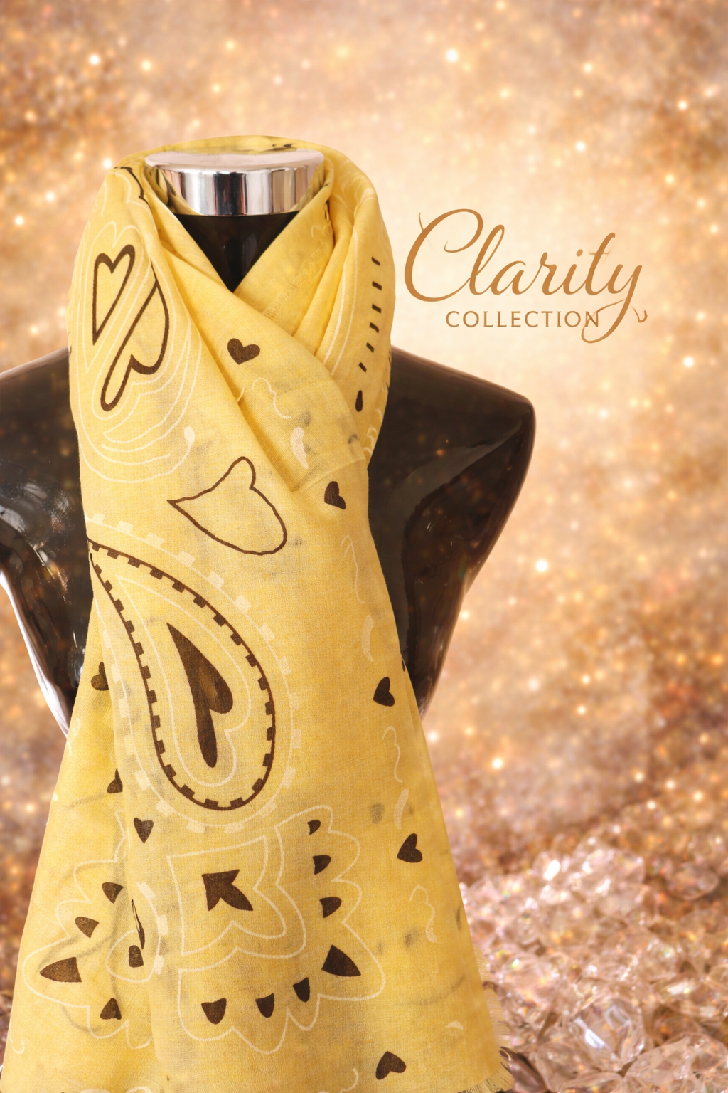 Gele sjaal met donkere motieven